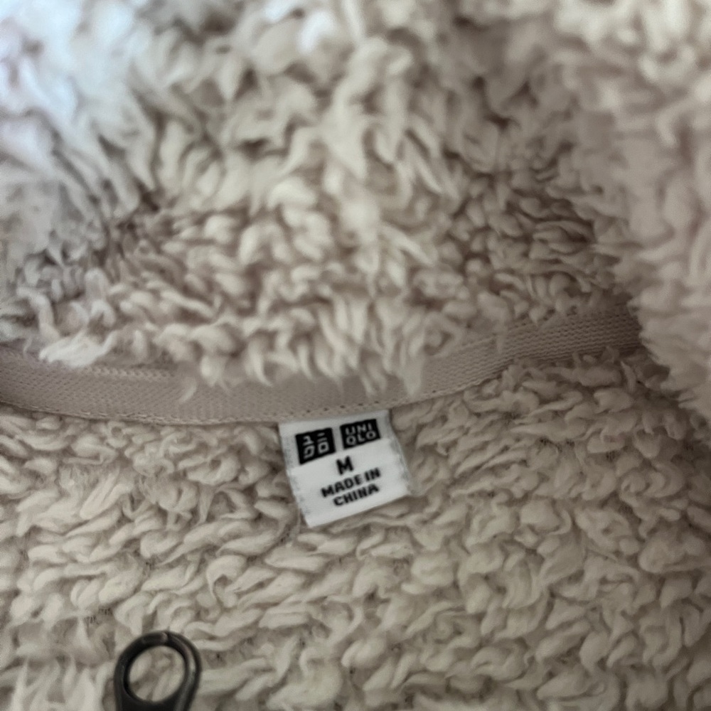 Uniqlo white fur jacket size medium fits bit bigger